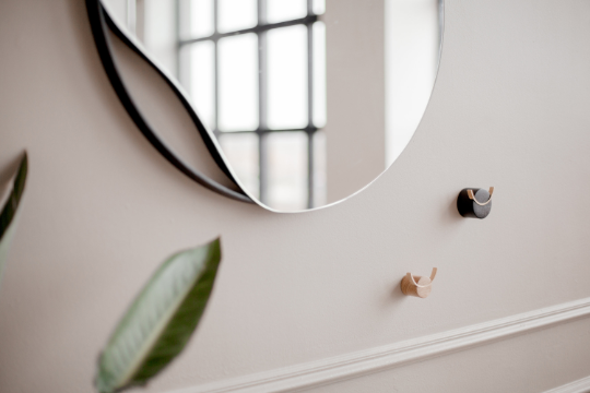 Black painted wall hook in solid oak wood and brass